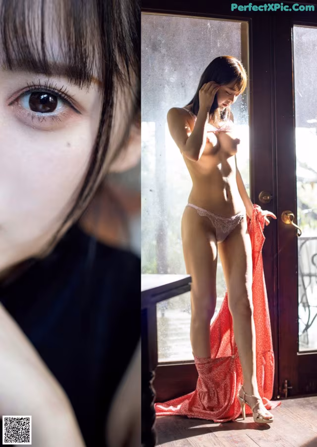 A woman in a pink lingerie standing in front of a window.