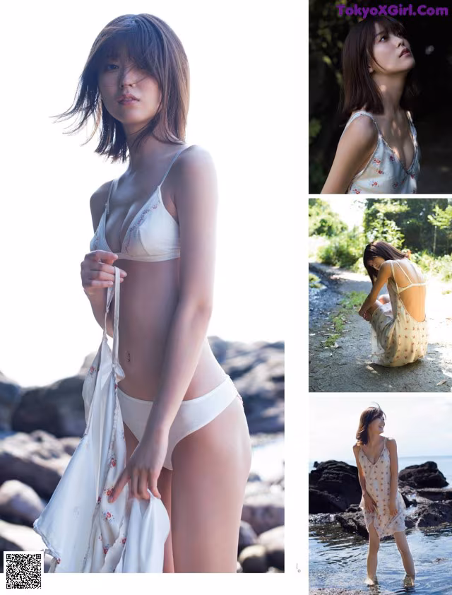 A woman in a white bikini standing in the water.