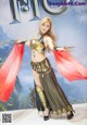 A woman in a costume is posing for a picture.